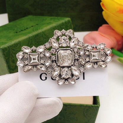 GG Crystal Horse Eye Brooch