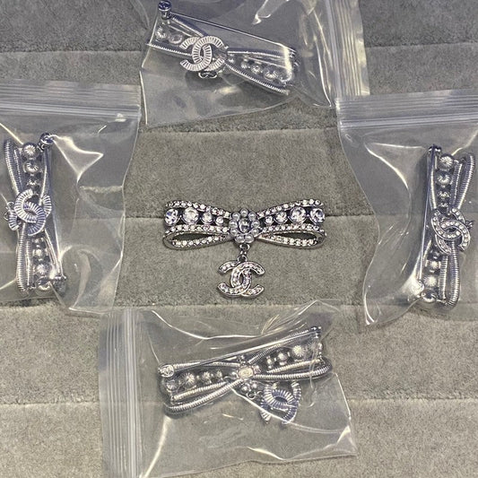 CC Bow Tie Pave Diamond Brooch
