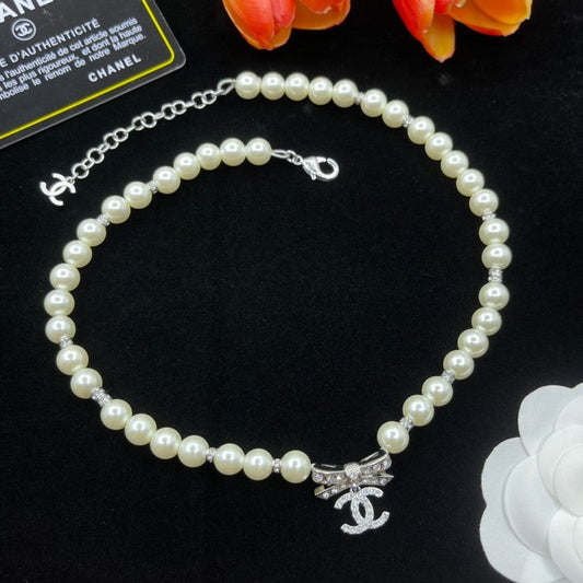 CC Bow Tie Pearls Necklace