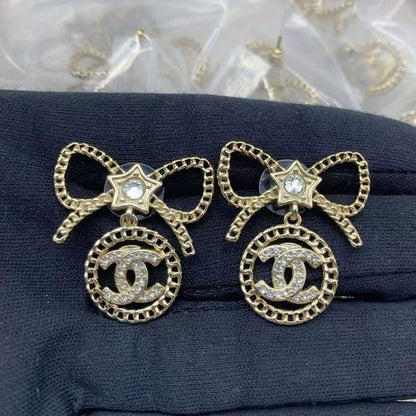 CC Bow Tie Diamond Earrings