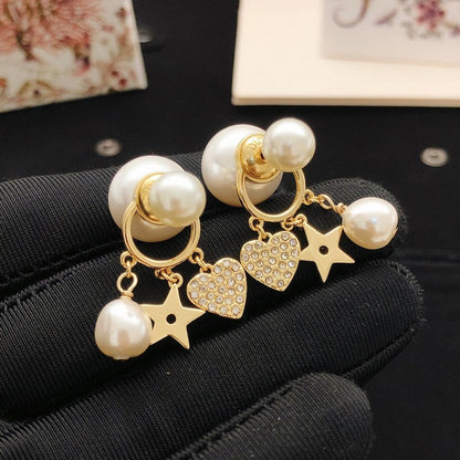 CD Tribales Heart Pearl Earrings