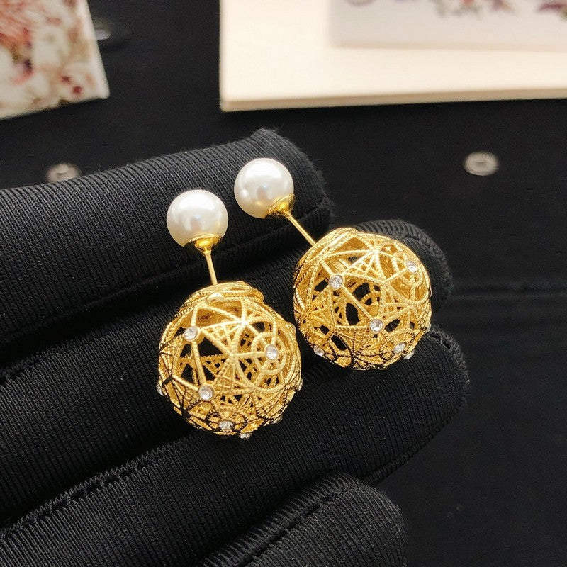 CD Tribales Hollow Gold Ball Earrings