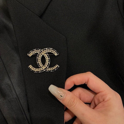 CC Leather Gold Brooch