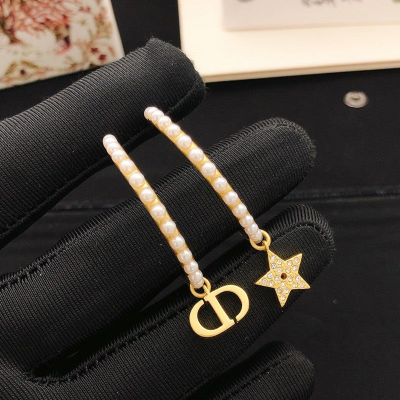 CD Tribales Moon & Star Pearl Earrings