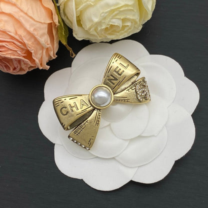CC Bow Tie Pearl Gold Brooch