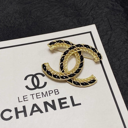 CC Leather Gold Brooch
