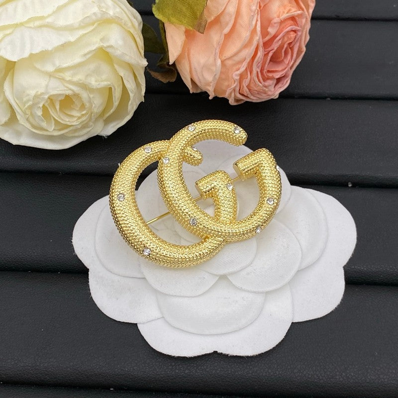 GG Diamond Gold Brooch