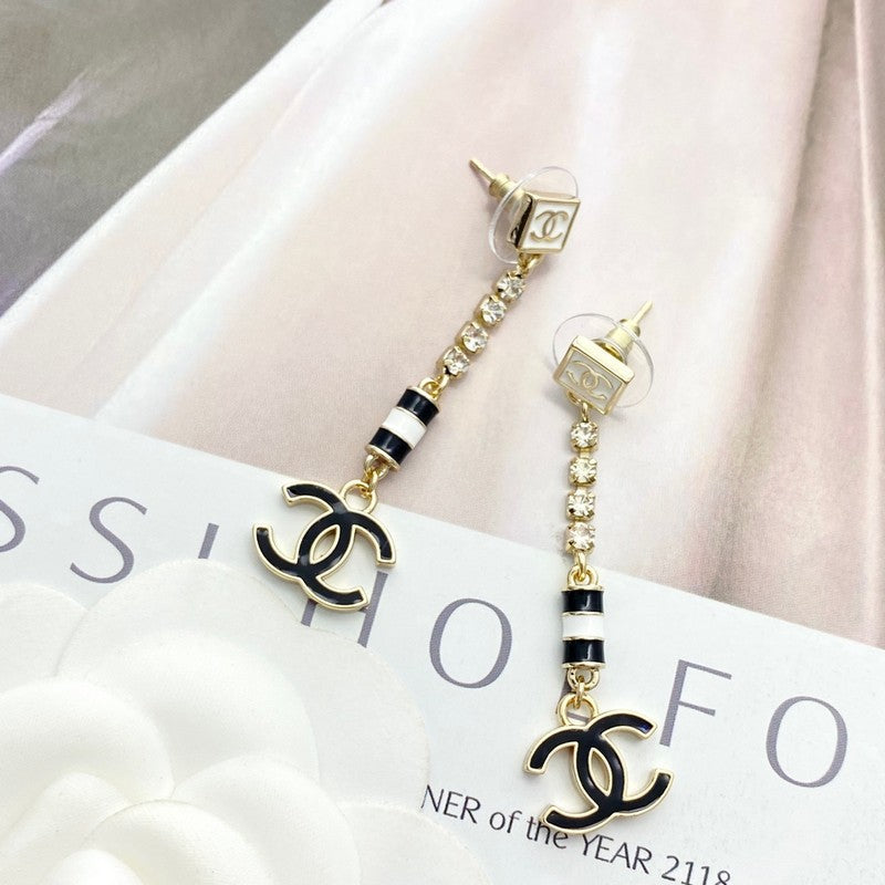 CC 24C Black Gold Tassel Earrings