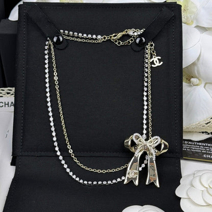 CC 25K Bow Tie Diamond Gold Necklace
