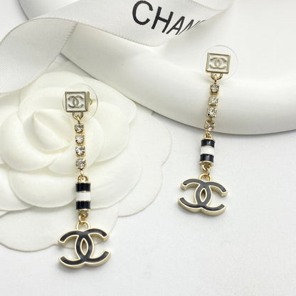 CC 24C Black Gold Tassel Earrings
