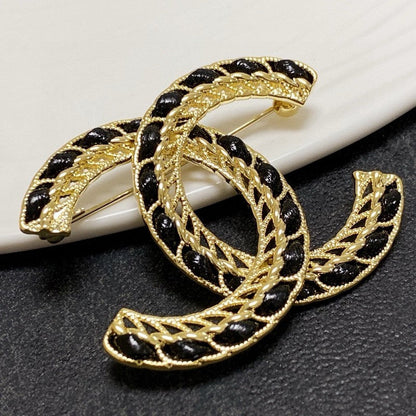 CC Leather Gold Brooch