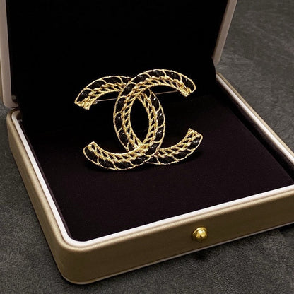 CC Leather Gold Brooch