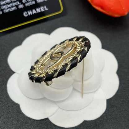CC Leather Gold Brooch