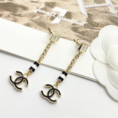 CC 24C Black Gold Tassel Earrings