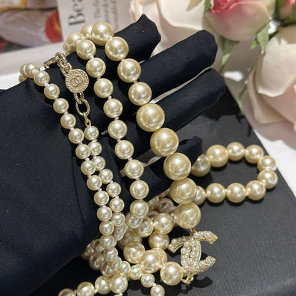 CC 100th Anniversary Fuax Pearl Long Necklace