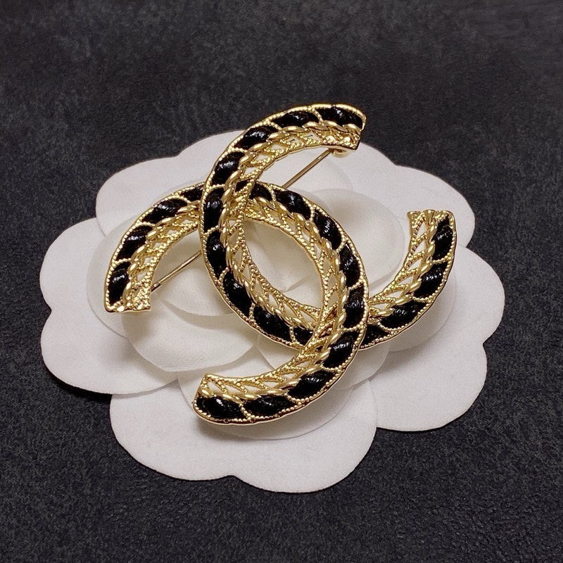 CC Leather Gold Brooch