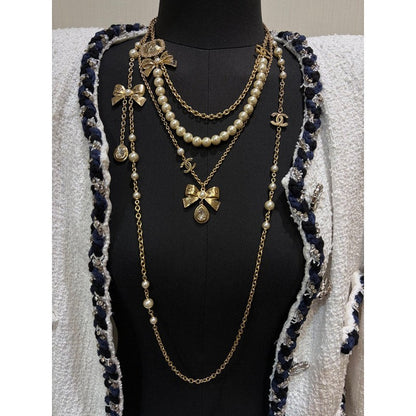 CC 25K Bow-Knot Pearl Long Necklace